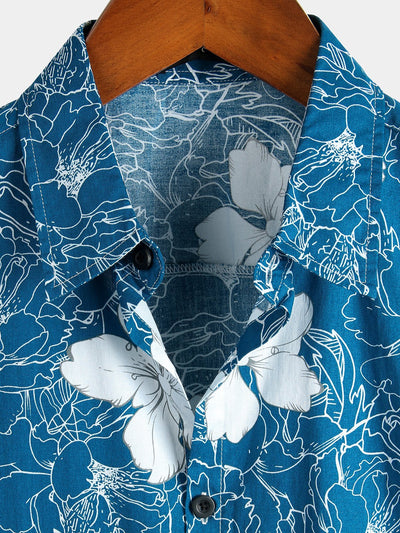 Camicia estiva da uomo hawaiana resort a maniche corte con motivo floreale blu